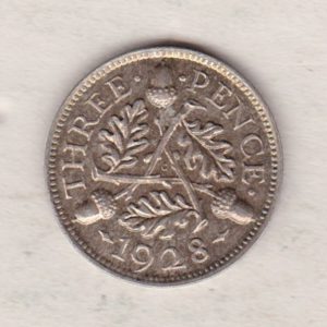 1928 Silver Threepence coin featuring King George V on the obverse. The reverse features three oak sprigs with three acorns.