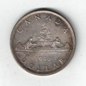 1946 Canada Silver One Dollar Coin. The obverse side of the coin features George VI facing left. All coins are in stock for dispatch.