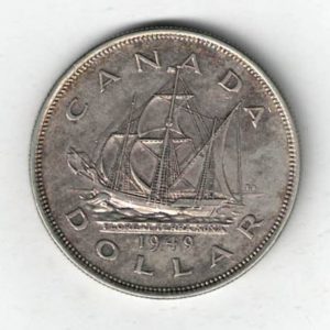 1949 Canada Silver One Dollar Coin. The obverse side of the coin features George VI facing left. The reverse features a ship sailing.
