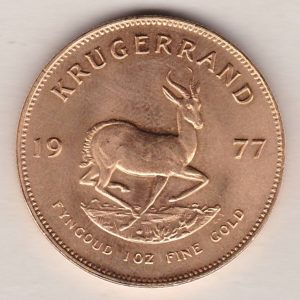 1977 South Africa Gold One Ounce Krugerrand. Investment one ounce gold coin featuring Paul Kruger on the Obverse. The springbok on the Reverse.
