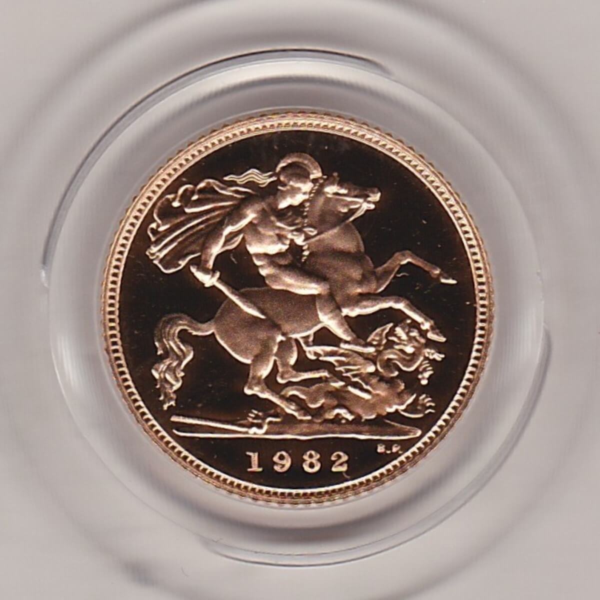 1982 gold proof half sovereign coin in capsule. This coin features Queen Elizabeth II on the obverse and St George and the dragon on the Reverse.