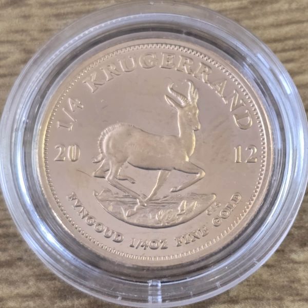 2012 South Africa Gold Proof Quarter Ounce Krugerrand coin featuring Paul Kruger on the Obverse. The springbok antelope is on the Reverse.