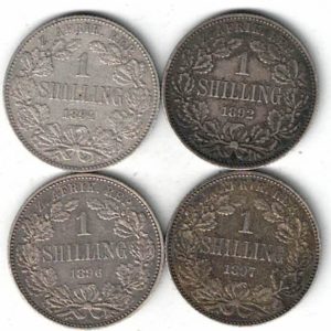1892/1894/1896 & 1897 South Africa Silver Shilling Coins. The obverse features the bust of president Johannes Paulus Kruger facing left.