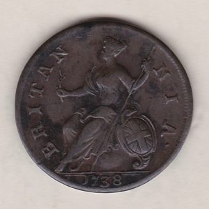 1738 copper halfpenny coin featuring King George II on the Obverse. Britannia seated facing left holding a trident on the Reverse. 