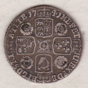 1741 silver sixpence coin featuring a laureate bust of George II. There are four crowned shields arranged in a cross on the Reverse.