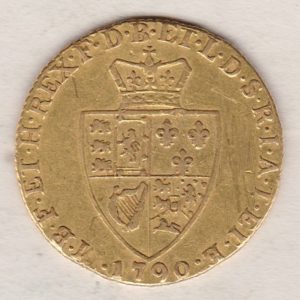 1790 Gold Guinea Coin featuring the fifth laureate head portrait of King George III on the obverse. The spade-shaped shield design is on the reverse.