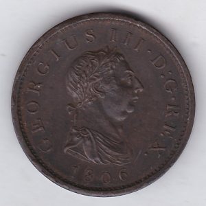 1806 copper penny coin featuring the portrait of King George III on the Obverse. The coin depicts Britannia seated to the left on the Reverse.