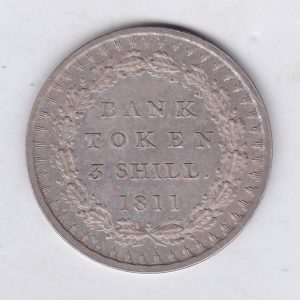 1811 Silver Three Shillings emergency issue bank token. The token features the laureate portrait of King George III on the obverse.
