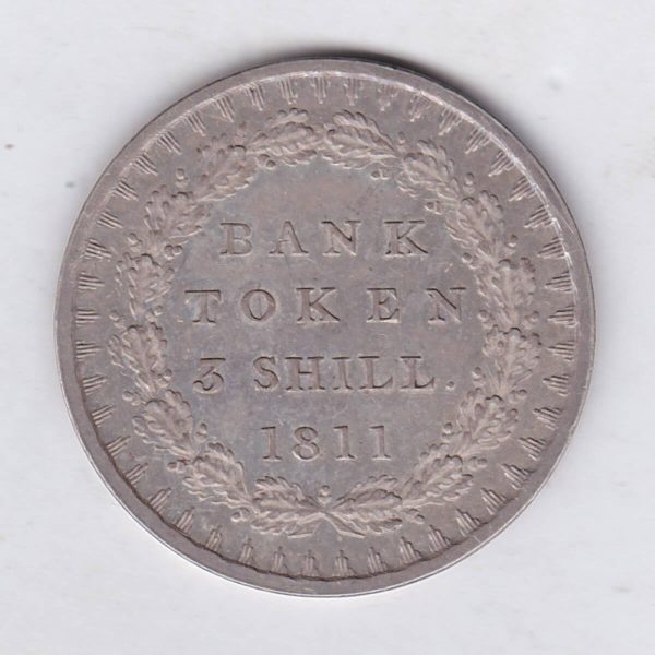 1811 Silver Three Shillings emergency issue bank token. The token features the laureate portrait of King George III on the obverse.