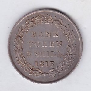 1813 Silver Three Shillings emergency issue bank token. The token features the laureate portrait of King George III on the obverse.