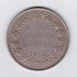 1814 Silver Three Shillings emergency issue bank token. The token features the laureate portrait of King George III on the obverse.