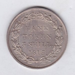 1815 Silver Three Shillings emergency issue bank token. The token features the laureate portrait of King George III on the obverse.