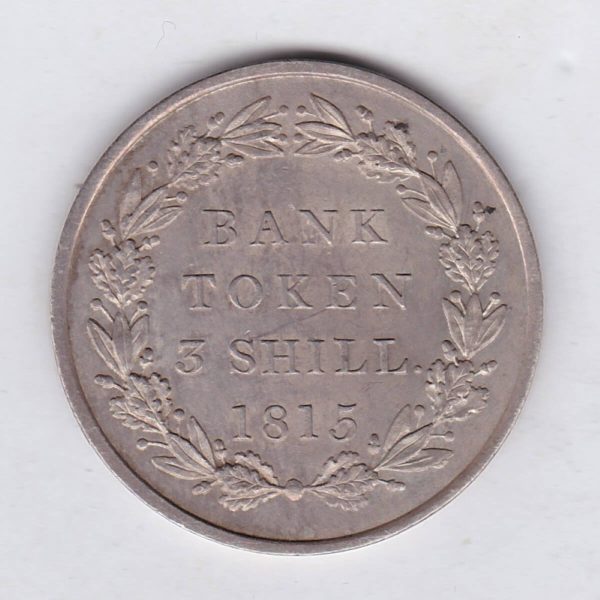 1815 Silver Three Shillings emergency issue bank token. The token features the laureate portrait of King George III on the obverse.