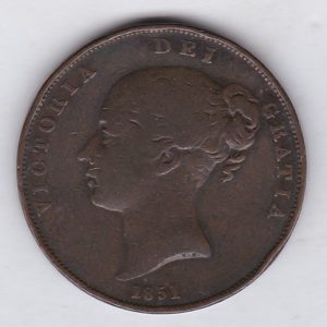 1851 copper penny coin featuring the young head portrait of Queen Victoria on the Obverse. The coin depicts Britannia seated to the right on the Reverse.