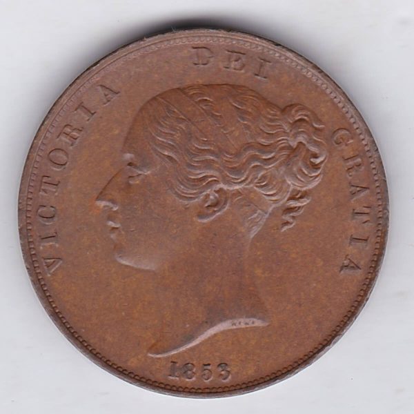 1853 copper penny coin featuring the young head portrait of Queen Victoria on the Obverse. The coin depicts Britannia seated to the right on the Reverse.