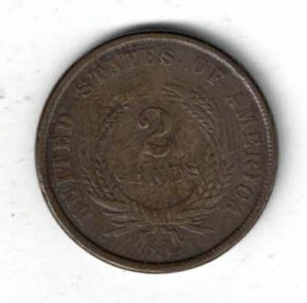 1864 USA Bronze Two Cents Coin. The Obverse features a shield in wreath with the USA motto. The reverse features the denomination in a wheat ears.