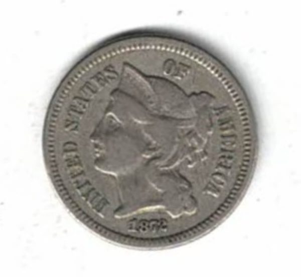 1872 USA Nickel Three Cents Coin. The Obverse features a female portrait facing left. The reverse features roman numerals within a wreath.