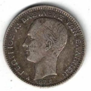 1873 A Greece One Drachmai Coin . The obverse features George I, The reverse features arms within the crowned mantle with denomination below.