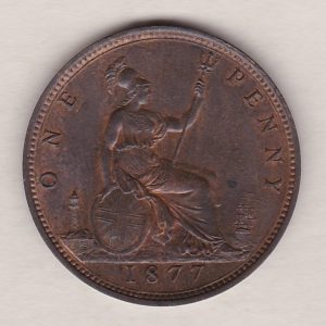 1877 bronze penny coin featuring the young head portrait of Queen Victoria on the Obverse. The coin depicts Britannia seated to the right on the Reverse.