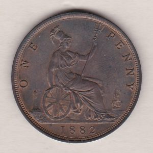 1882 H bronze penny coin featuring the young head portrait of Queen Victoria on the Obverse. The coin depicts Britannia seated to the right on the Reverse.