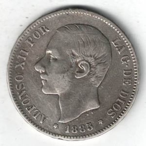 1885 MSM Spain Silver Five Pesetas Coin. The obverse features the bust of Alfonso XII left. The reverse features the crowned coat arms of Spain.
