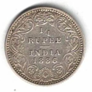 1886 India Silver Quarter Rupee Coin . The obverse side of this coin features the portrait of Queen Victoria facing left.