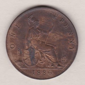 1886 bronze penny coin featuring the young head portrait of Queen Victoria on the Obverse. The coin depicts Britannia seated to the right on the Reverse.