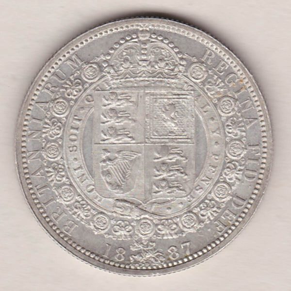 1887 Silver Halfcrown coin featuring the Jubilee head of Queen Victoria on the Obverse. The shield of royal arms completes the Reverse design.