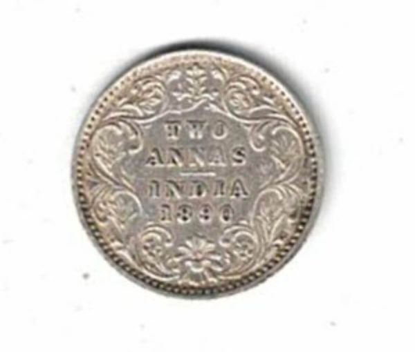 1890 India Silver Two Annas Coin. The obverse side of this coin features the portrait of Queen Victoria facing left. All coins are in stock.