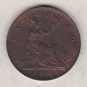 1891 bronze farthing coin featuring the young head Queen Victoria on the Obverse. Britannia seated facing right on the Reverse.