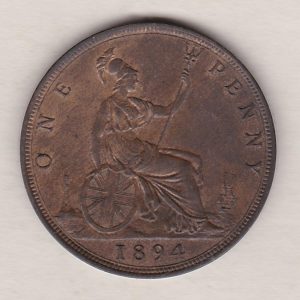 1894 bronze penny coin featuring the young head portrait of Queen Victoria on the Obverse. The coin depicts Britannia seated to the right on the Reverse.