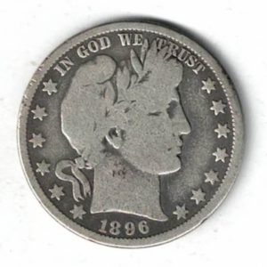 1896 O USA Barber Silver Half Dollar Coin. The reverse features a heraldic eagle with 13 stars above with the denomination below.