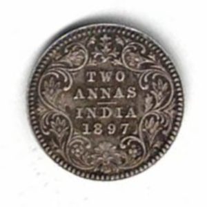 1897 India Silver Two Annas Coin. The obverse side of this coin features the portrait of Queen Victoria facing left. All coins are in stock.