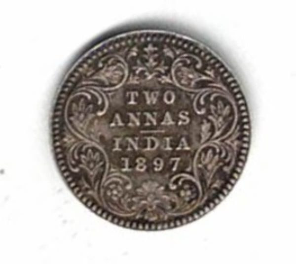 1897 India Silver Two Annas Coin. The obverse side of this coin features the portrait of Queen Victoria facing left. All coins are in stock.