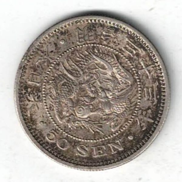 1900 (YR33) Japan Silver Fifty Sen Coin. The obverse features a dragon within beaded circle and legends above. All coins are in stock.