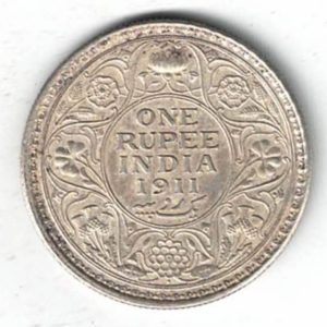 1911 India Silver One Rupee Coin. The obverse features George V. The reverse features The reverse has the denomination and date within circle.