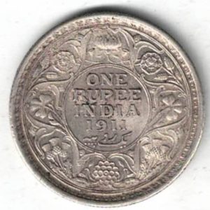 1911 India Silver One Rupee Coin. The obverse features George V. The reverse features The reverse has the denomination and date within circle.