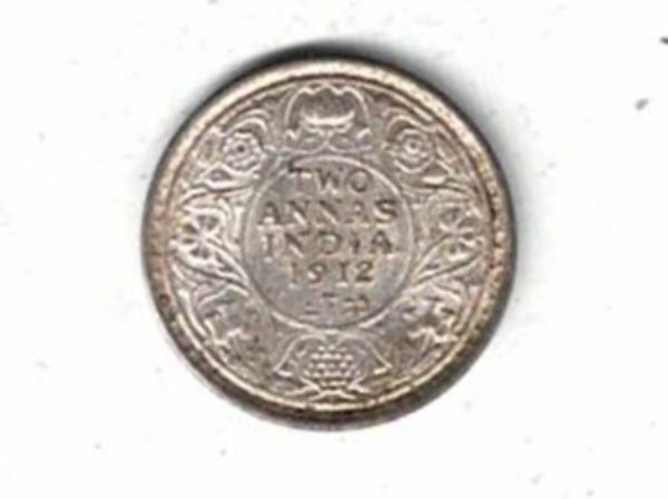1912 B India Silver Two Annas Coin . The obverse side of this coin features the portrait of King George V. All coins are in stock.