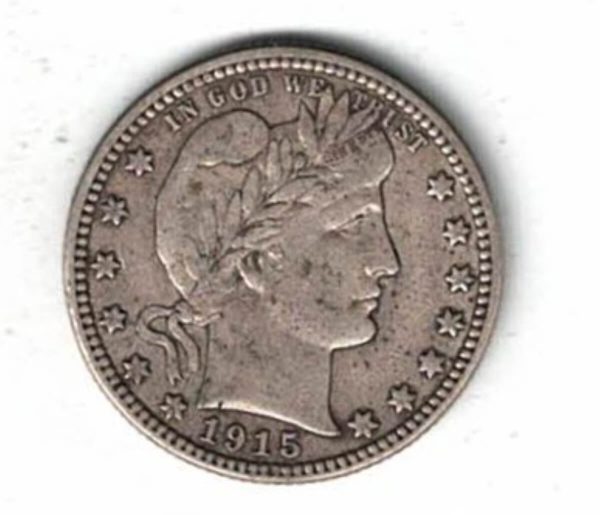 1915 D USA Barber Silver Quarter Dollar Coin. The Obverse features the bust of miss liberty looking right. The reverse features an heraldic eagle.