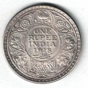 1918 India Silver One Rupee Coin. The obverse features George V. The reverse features The reverse has the denomination and date within circle.