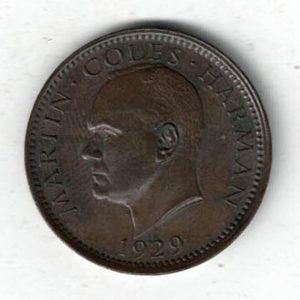 1929 Lundy Bronze Puffin Coin. The obverse features Martin Coles Harman, with the date 1929 below. The reverse side of the coin features a Puffin.