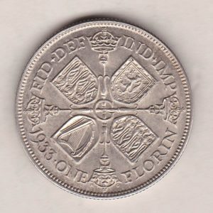 1933 Silver Florin coin. The portrait of King George V on the Obverse. The cruciform crowned sceptres around central G on the reverse.