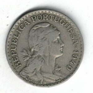 1940 Portugal One Escudo Coin. The obverse features the head of a libertine facing right. The reverse features the coat of arms of Portugal.