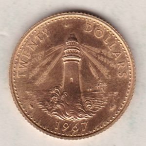 1967 Bahamas Twenty Dollars Coin. The obverse features the bust of Elizabeth II facing right. Then reverse features a lighthouse.