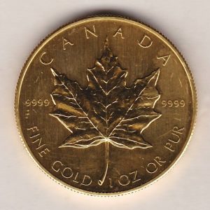 1985 Gold Canada One Ounce coin. Investment one ounce gold coin featuring Queen Elizabeth II on the Obverse. The Maple leaf on the Reverse.