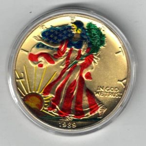 1989 Silver USA Enamelled One Ounce Eagle Coin The liberty is on the obverse, The eagle is on the reverse. The coin contains one ounce of 999 fine silver.