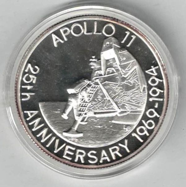 1993 Turks And Caicos Silver One Ounce Apollo Eleven Coin . The obverse features the portrait of  Queen Elizabeth II facing right.