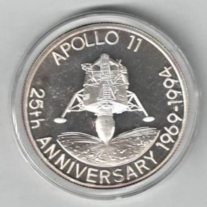 1994 Turks And Caicos Silver One Ounce Apollo Eleven Coin. The obverse features the portrait of  Queen Elizabeth II facing right.