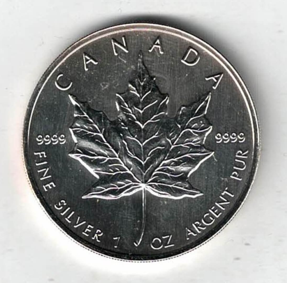 1998 Silver Canada One Ounce Maple. Elizabeth II is on the obverse, The Maple is on the reverse. The coin contains one ounce of 9999 fine silver.