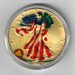 1998 Silver USA Enamelled One Ounce Eagle Coin The liberty is on the obverse, The eagle is on the reverse. The coin contains one ounce of 999 fine silver.